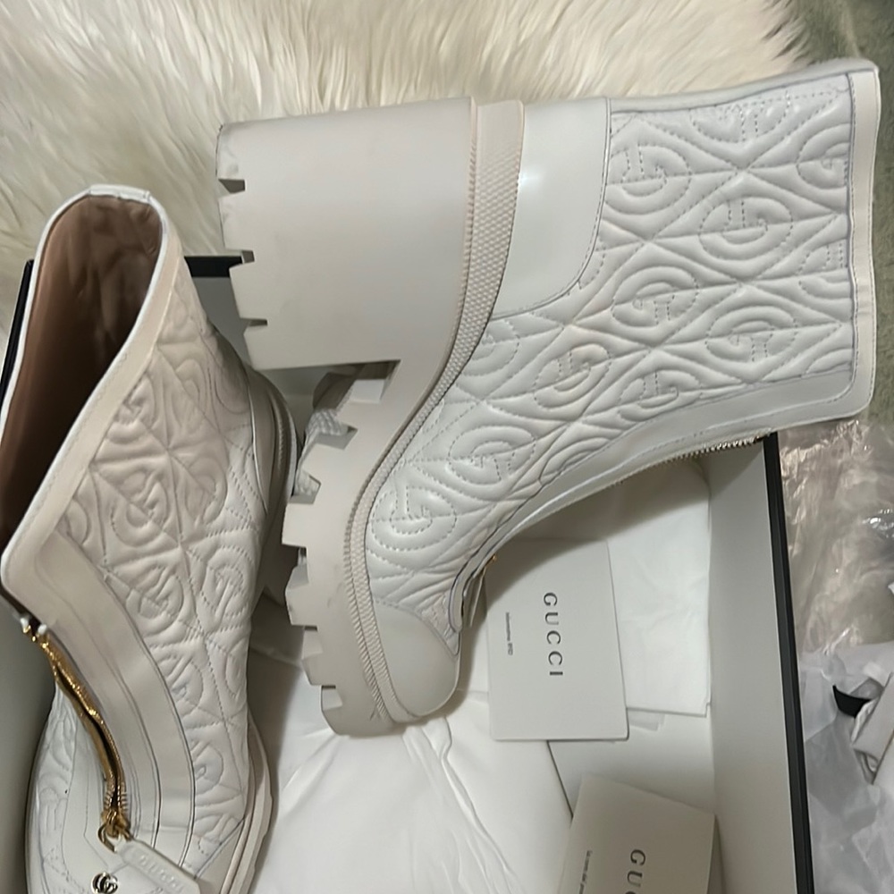 Authentic Gucci boots in great condition only wore once.